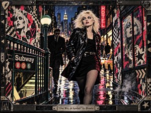 A confident blonde woman in black leather strides through a rain-soaked 1970s New York street, framed by gritty punk textures, subway architecture, neon signs, and shadowy figures. Hot pink, black, cream, and reflected city lights heighten the tense, rebellious mood, blending cinematic realism with distressed new-wave poster art.