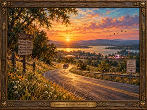 A winding country road descends toward a shimmering lake as a pickup truck travels through golden fields and wildflowers. Fiery orange and violet clouds illuminate distant hills, soaring birds, and festive shoreline lights. Rich oil brushwork captures summer freedom, surrounded by carved wood, guitar decorations, and an engraved brass title plate.