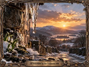 A melting icicle hangs above snowdrops and moss-covered stone, overlooking a winding winter road and distant lake beneath glowing mountains. Warm sunset light contrasts with icy blues and earthy browns, creating a reflective mood of thaw and renewal. An ornate Celtic-inspired bronze frame completes the richly detailed, realistic composition.